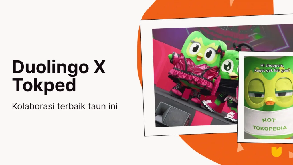 Duo dan Toped berdiri berdampingan di billboard Jakarta pusat dengan slogan kolaborasi resmi Duolingo x Tokopedia.