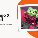 Duo dan Toped berdiri berdampingan di billboard Jakarta pusat dengan slogan kolaborasi resmi Duolingo x Tokopedia.